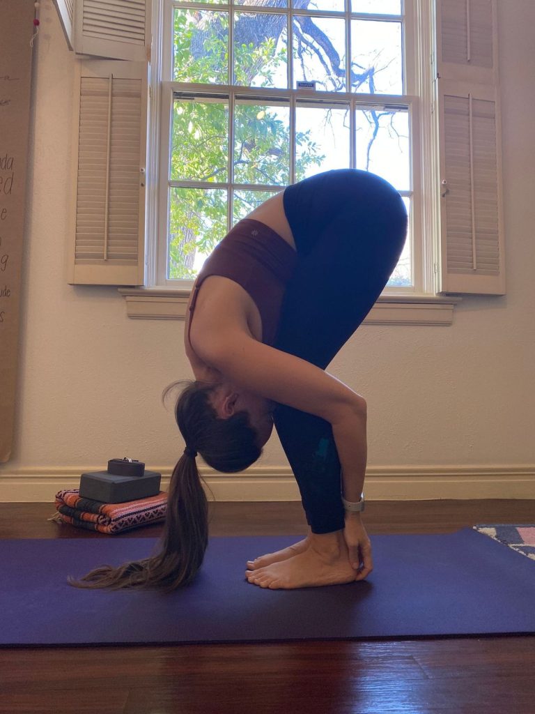 yoga poses for digestion - standing fold